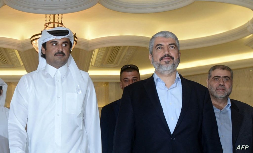 A handout picture released by the Palestinian president's office (PPO) shows Palestinian president Mahmud Abbas (C-L) meeting with Emir of Qatar Sheikh Tamim Bin Hamad al-Thani (C) and Hamas exiled leader Khaled Meshaal (C-R) in the capital Doha on August 21, 2014. AFP PHOTO/ PPO / THAER GHANEM
=== RESTRICTED TO EDITORIAL USE - MANDATORY CREDIT "AFP PHOTO/ PPO / THAER GHANEM" - NO MARKETING NO ADVERTISING CAMPAIGNS - DISTRIBUTED AS A SERVICE TO CLIENTS === (Photo by HO / AFP)